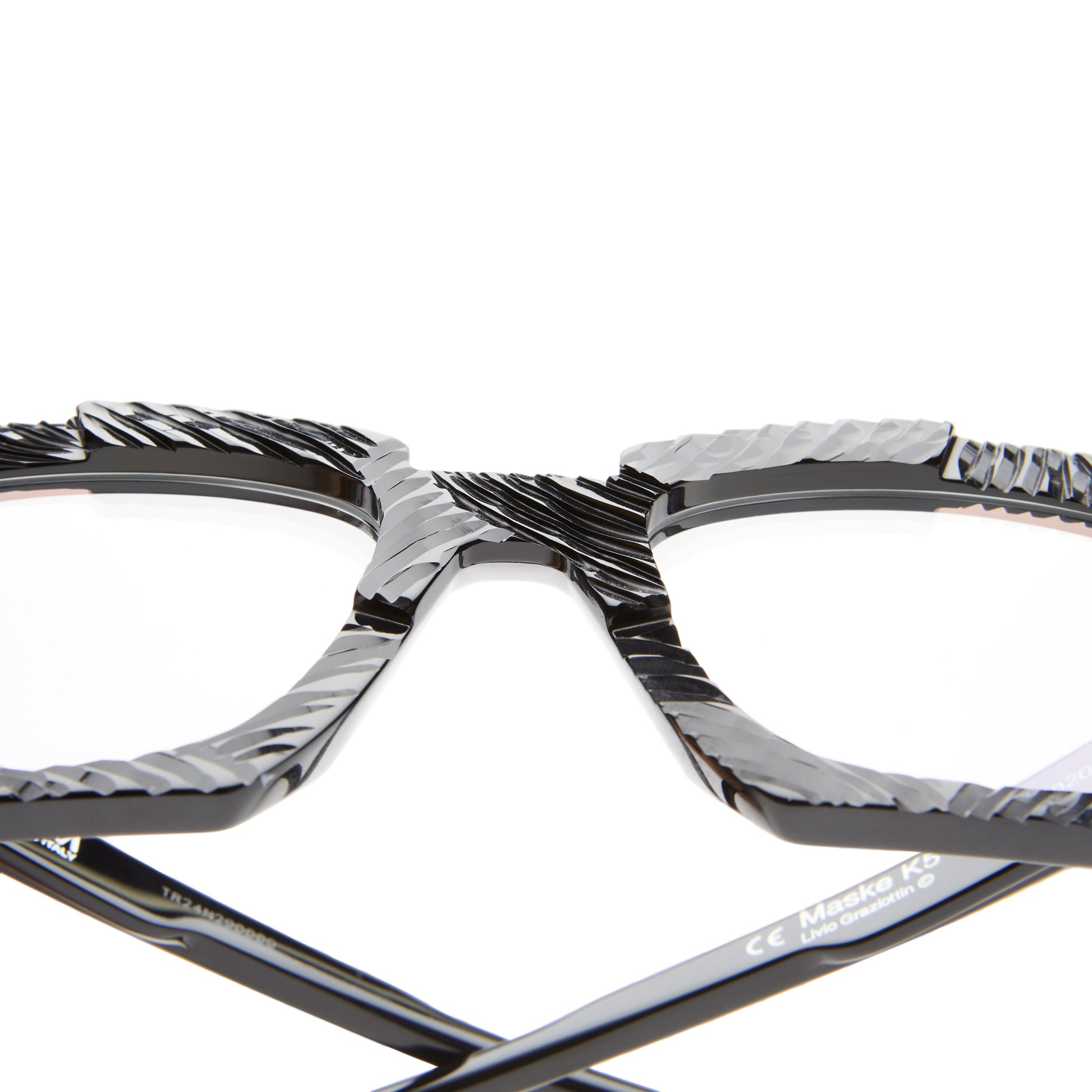 Kuboraum MASKE K5 - Tilded Arc