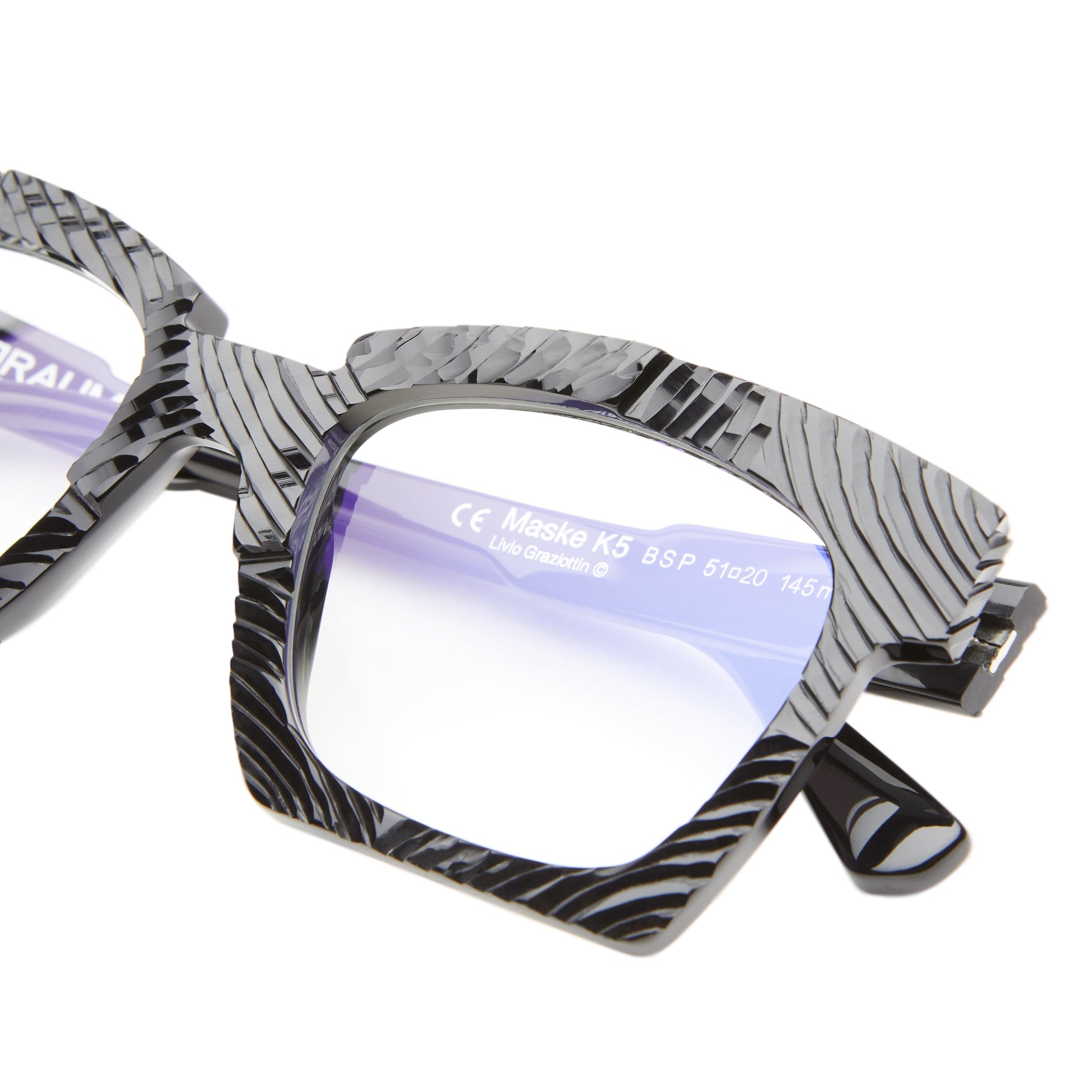 Kuboraum MASKE K5 - Tilded Arc